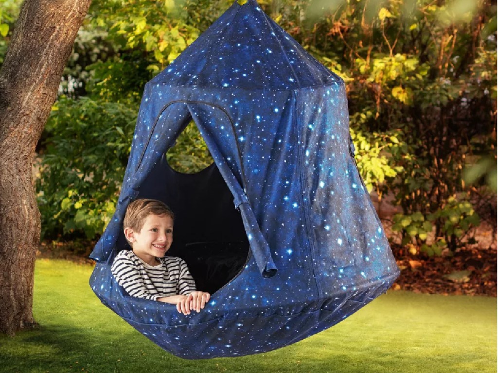 boy in a galaxy print members mark hangout pod