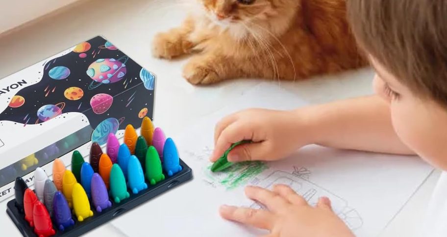 toddler coloring with mini rocket ship crayons