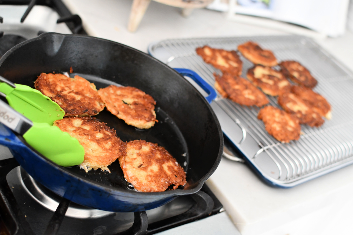 makine easy Hanukkah latkes in a pan