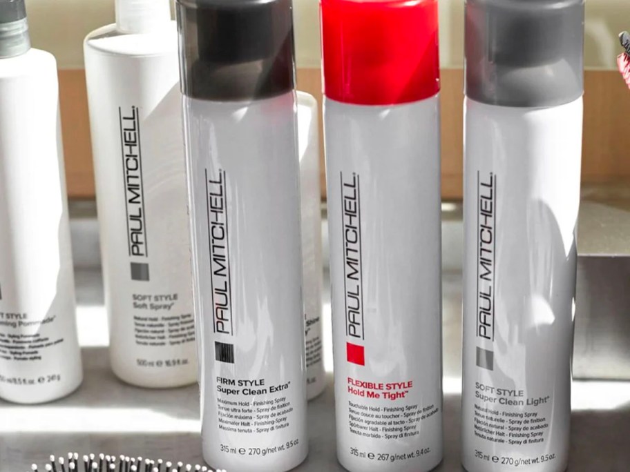 three paul mitchell hair sprays on counter