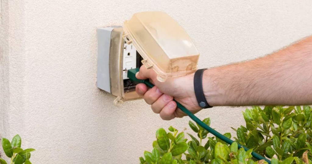 outdoor power cord being plugged in