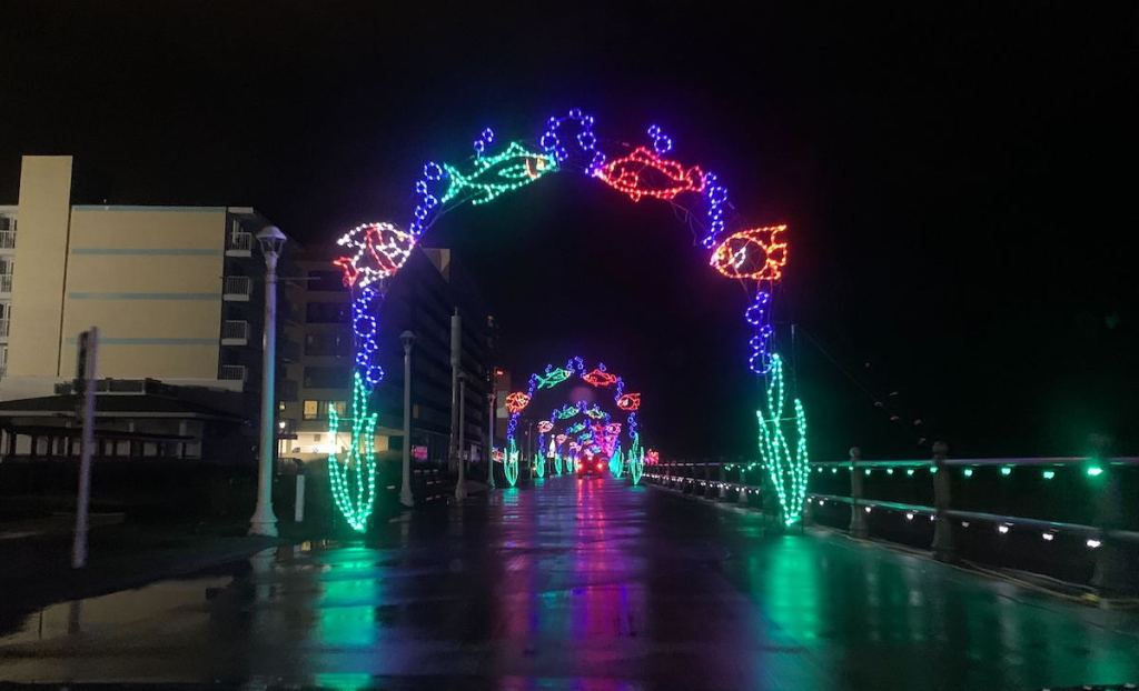 boardwalk with christmas fish lights 