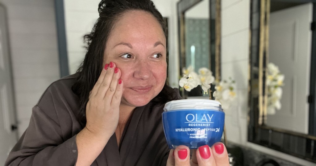 woman applying olay