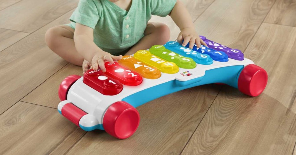 Baby with Xylophone on floor