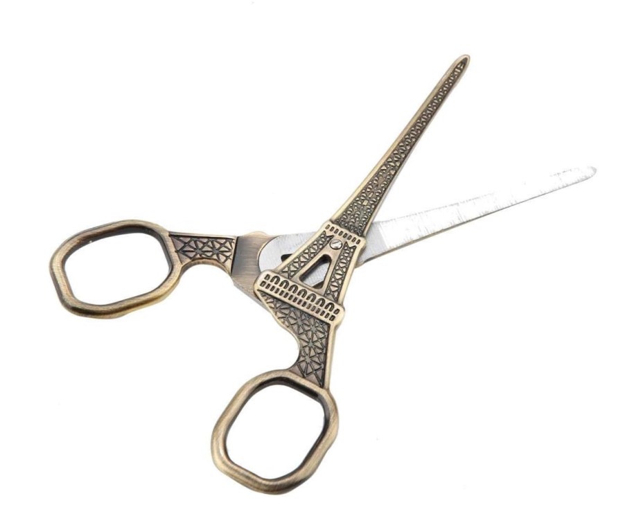 stock photo of eiffel tower scissors with white background