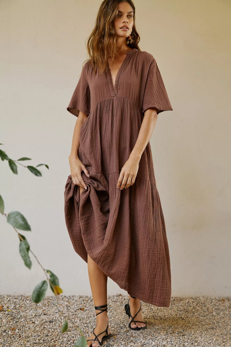 woman modeling brown maxi dress