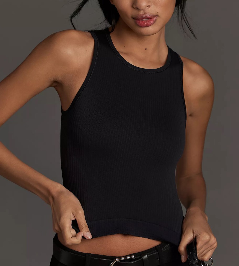 woman modeling black ribbed crop tank