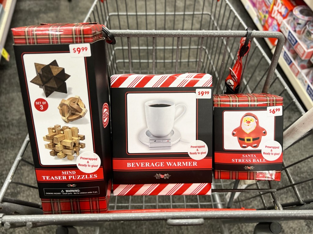 mind teaser puzzle set, mug warmer, and santa stress ball in shopping cart