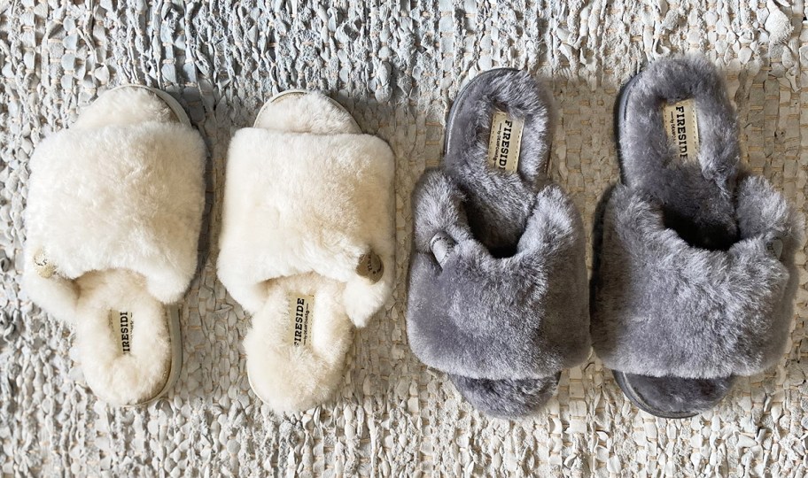 white and grey pairs of slipper slides on rug