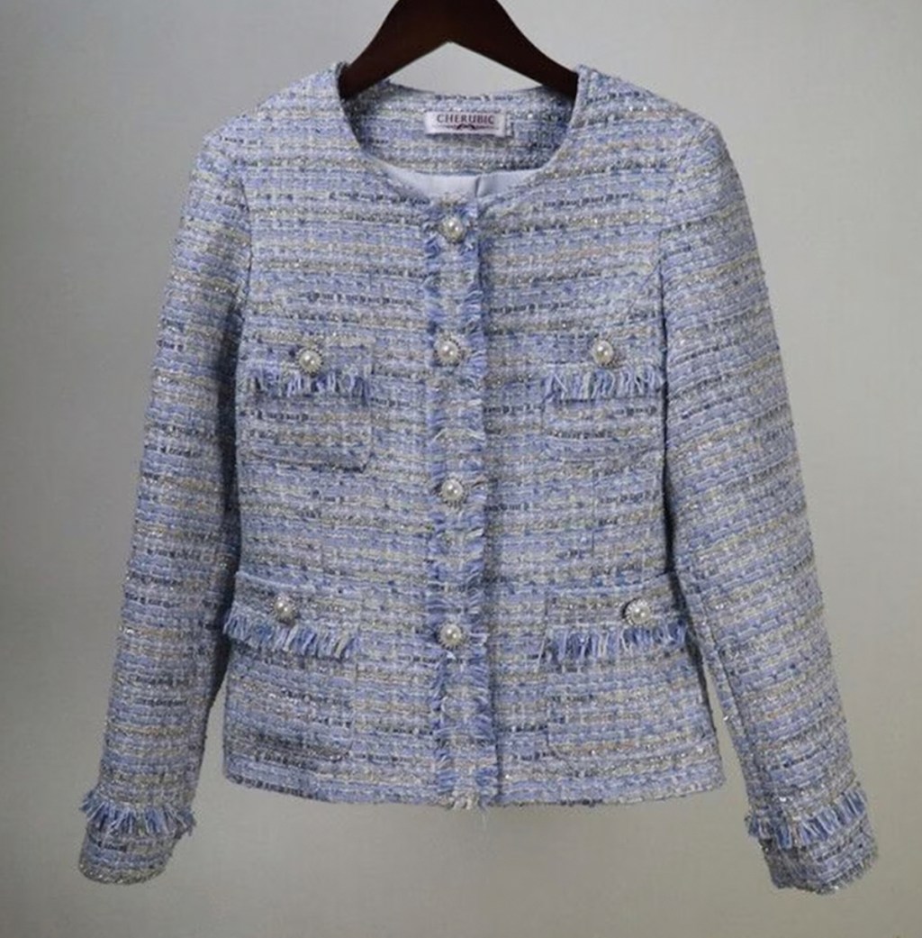 anthropologie clothes blue tweed jacket hanging on wood hanger