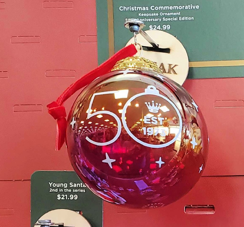 A red 50th anniversary Hallmark Keepsake Ornament 2023