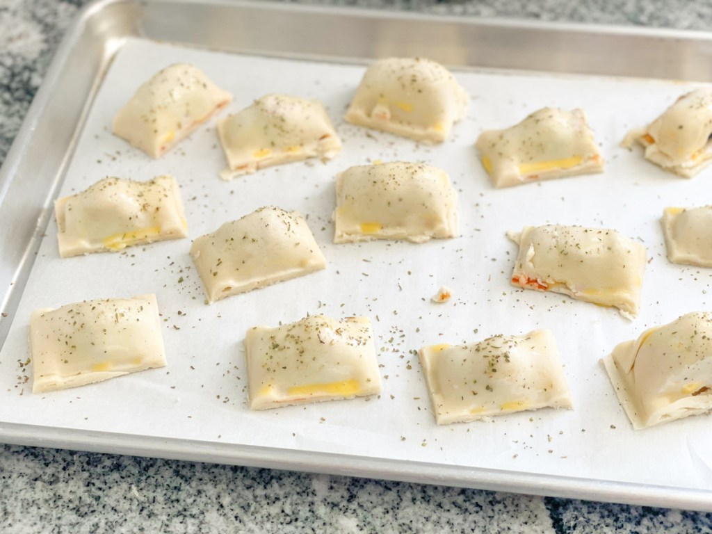 homemade pizza bites with egg wash and Italian seasoning