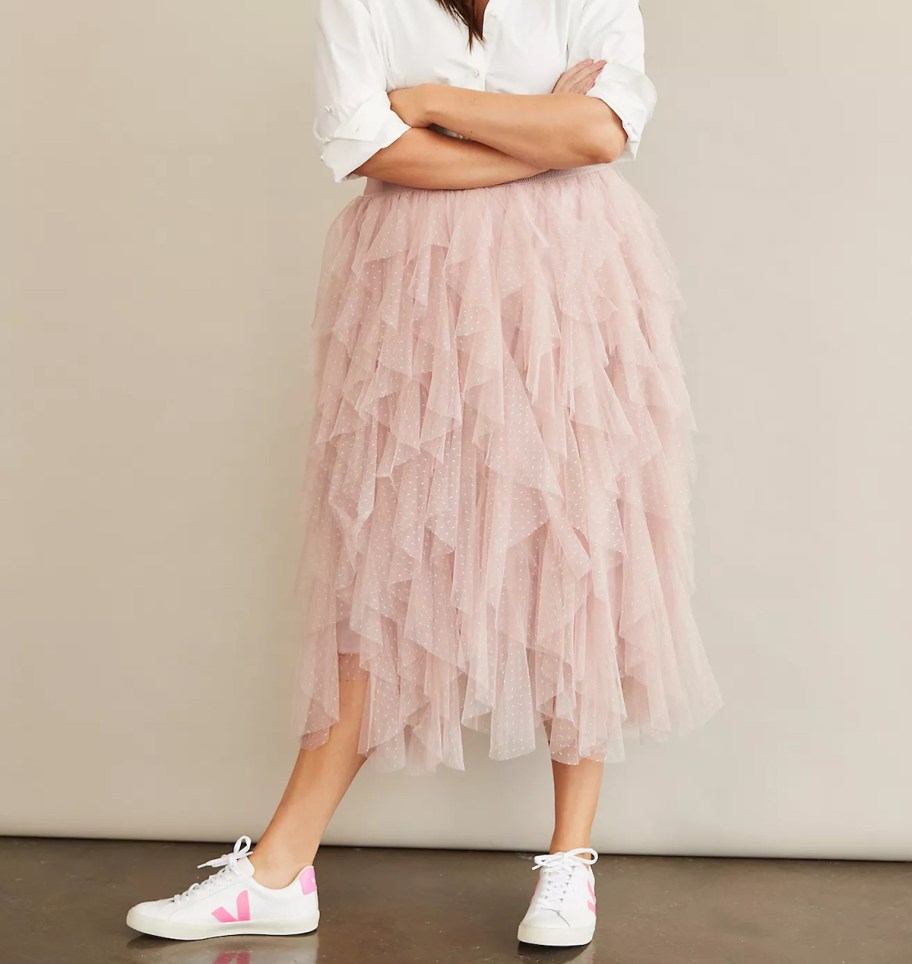 woman posing in pink tulle skirt