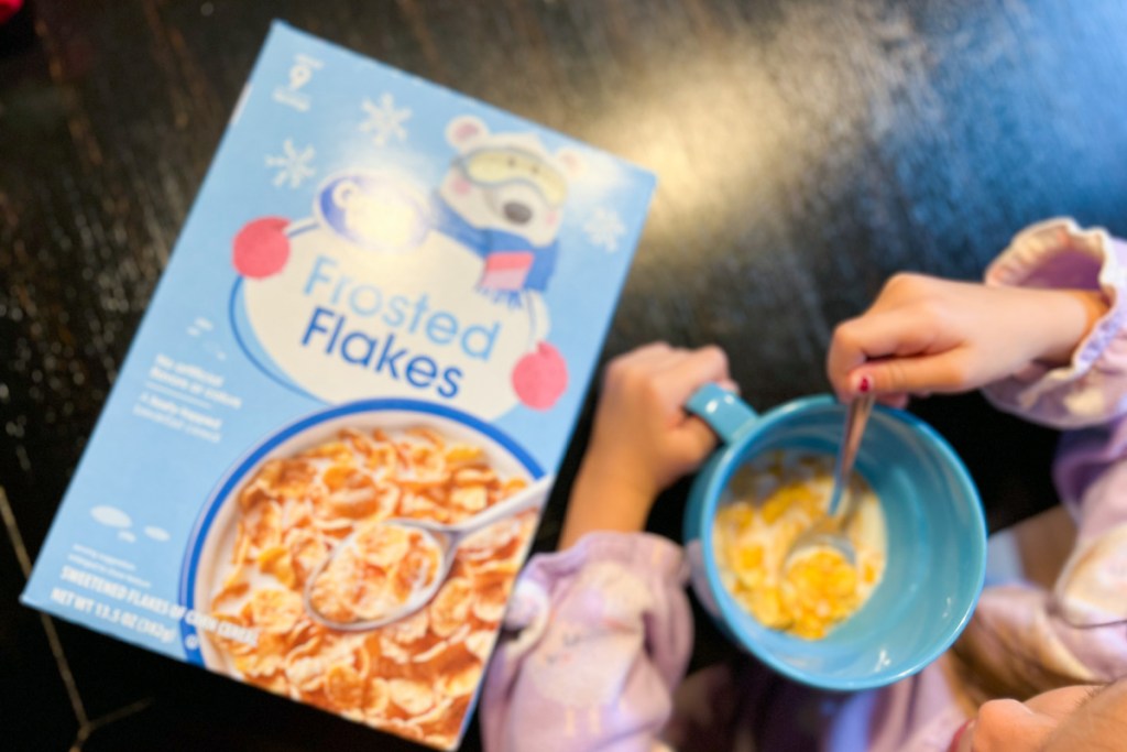 kid eating great value cereal