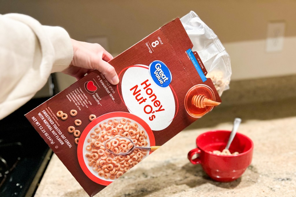 pouring cereal into bowl