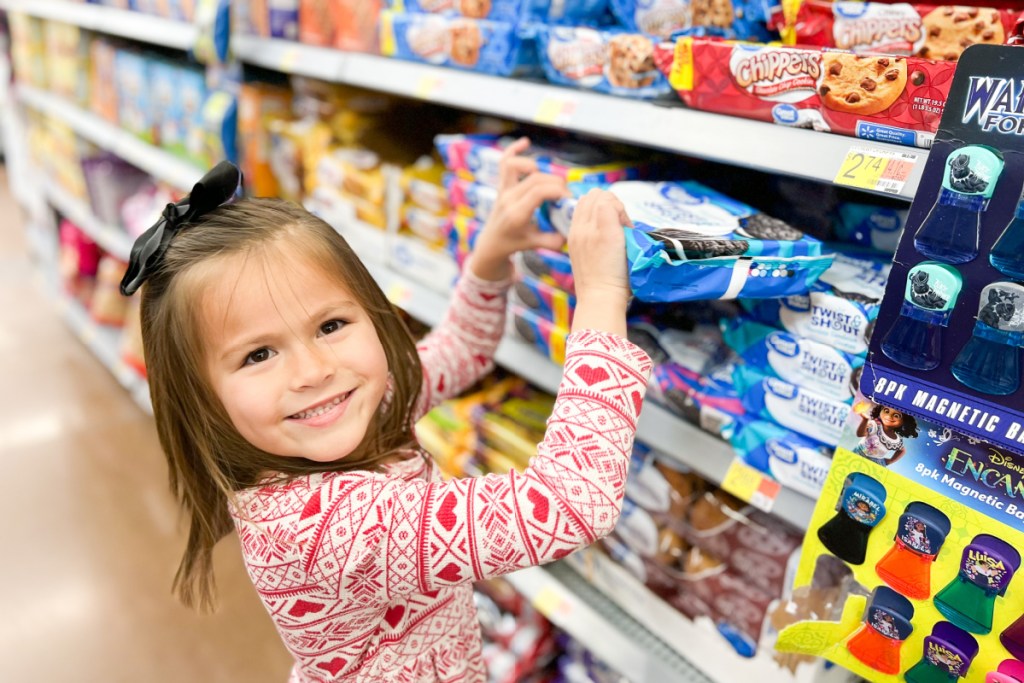 little girl shopping at walmart