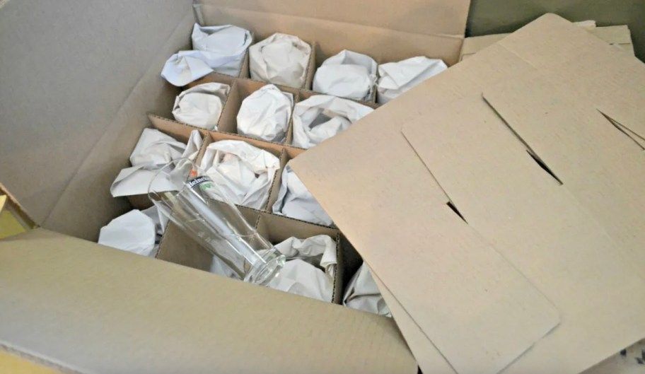 inside of packing box with wrapped beer glasses for moving