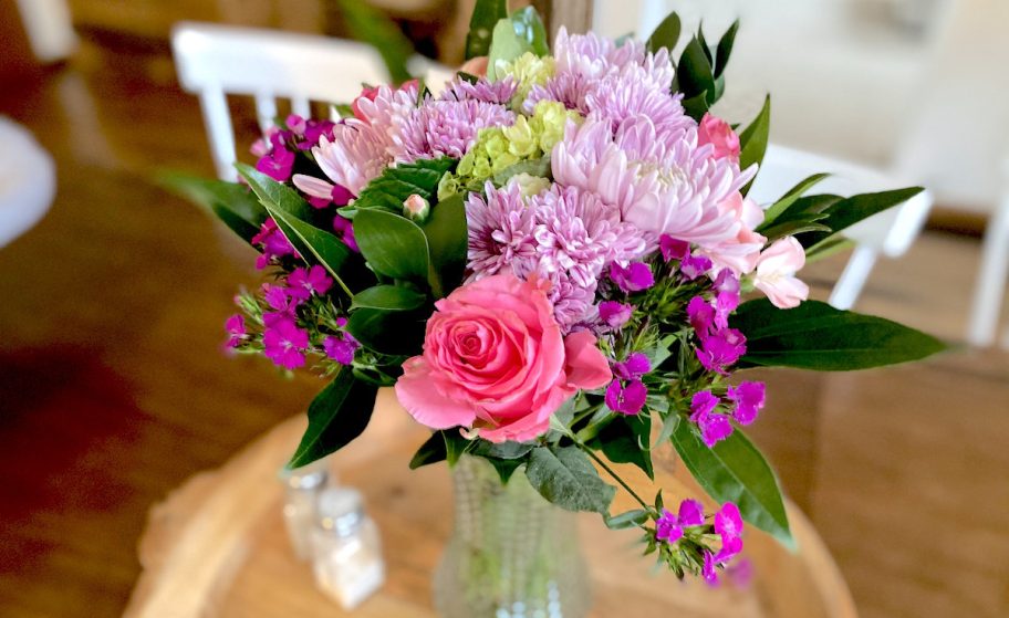 bouquet of flowers on table in vase