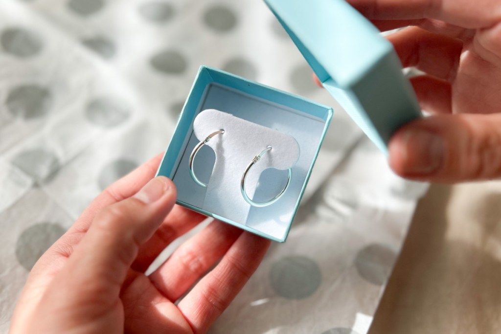 opening box of hoop earrings