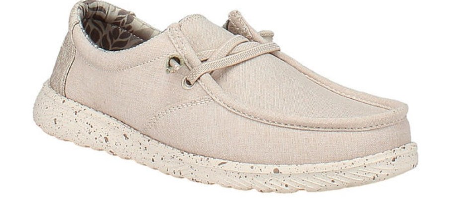 a tan canvas slip on shoe