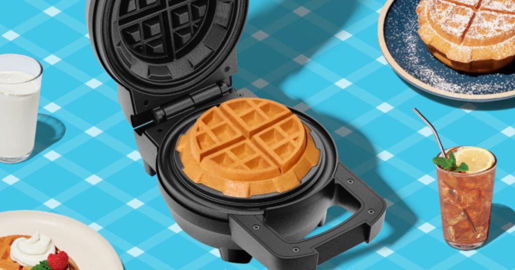 Chefman Big Stuff Waffle Maker with a waffle insode and plates of stuffed waffle creations around it