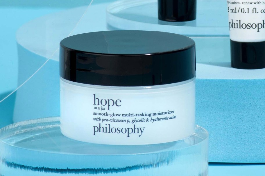 Philosophy Hope in a Jar Smooth-Glow Multi-Tasking Moisturizer on glass stand