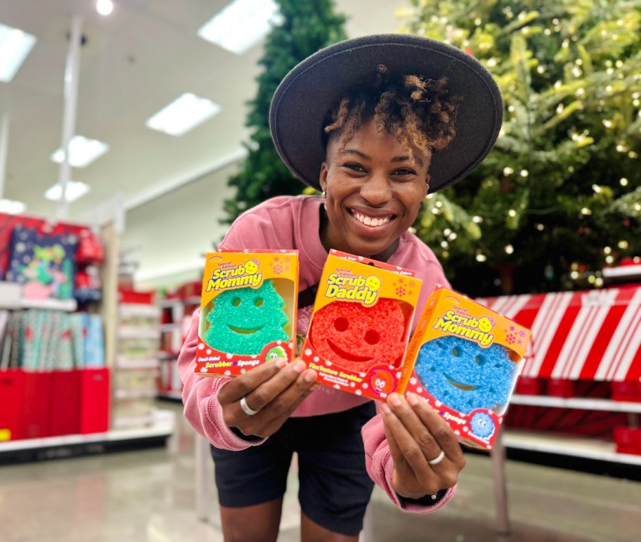 woman holding christmas holiday scrub daddy sponges