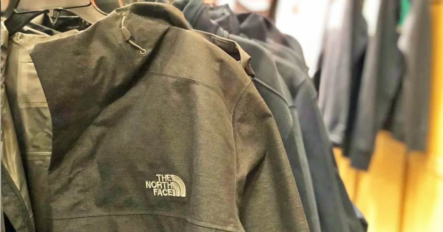 black north face jacket on hanger