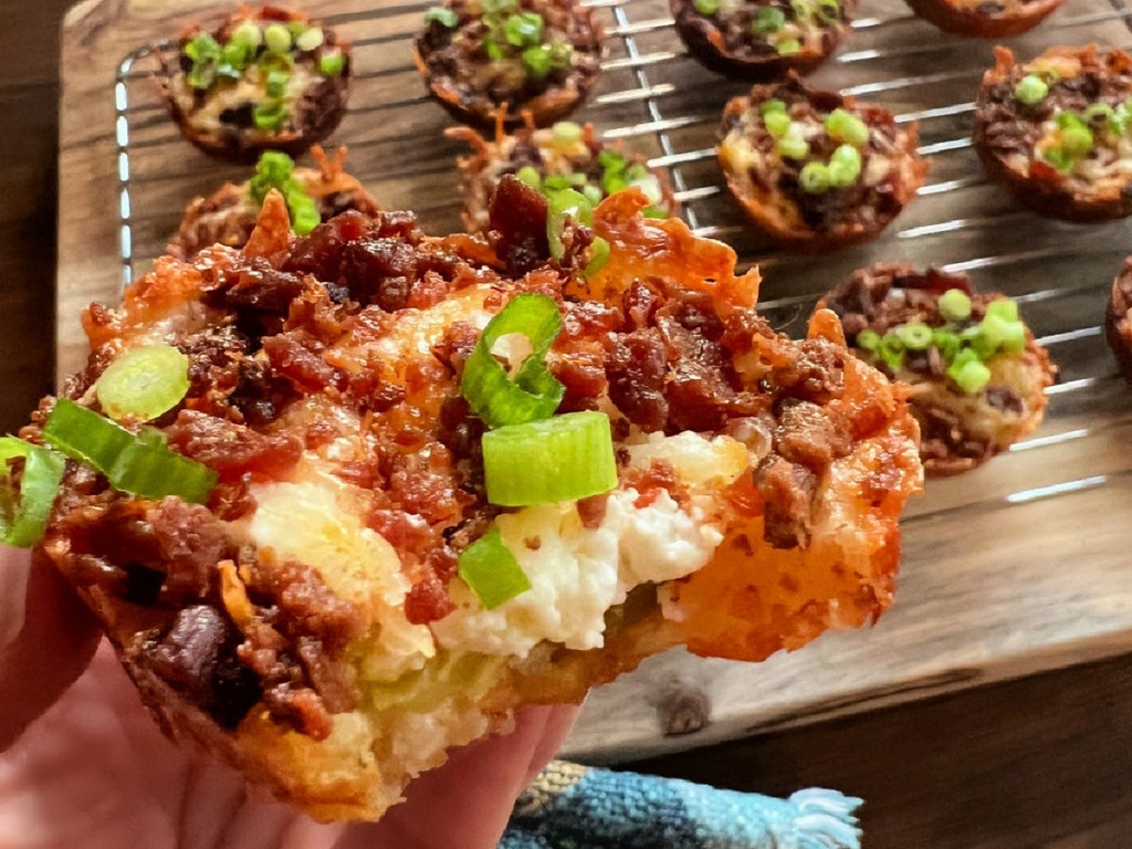 holding bacon cream cheese jalepeno bites 