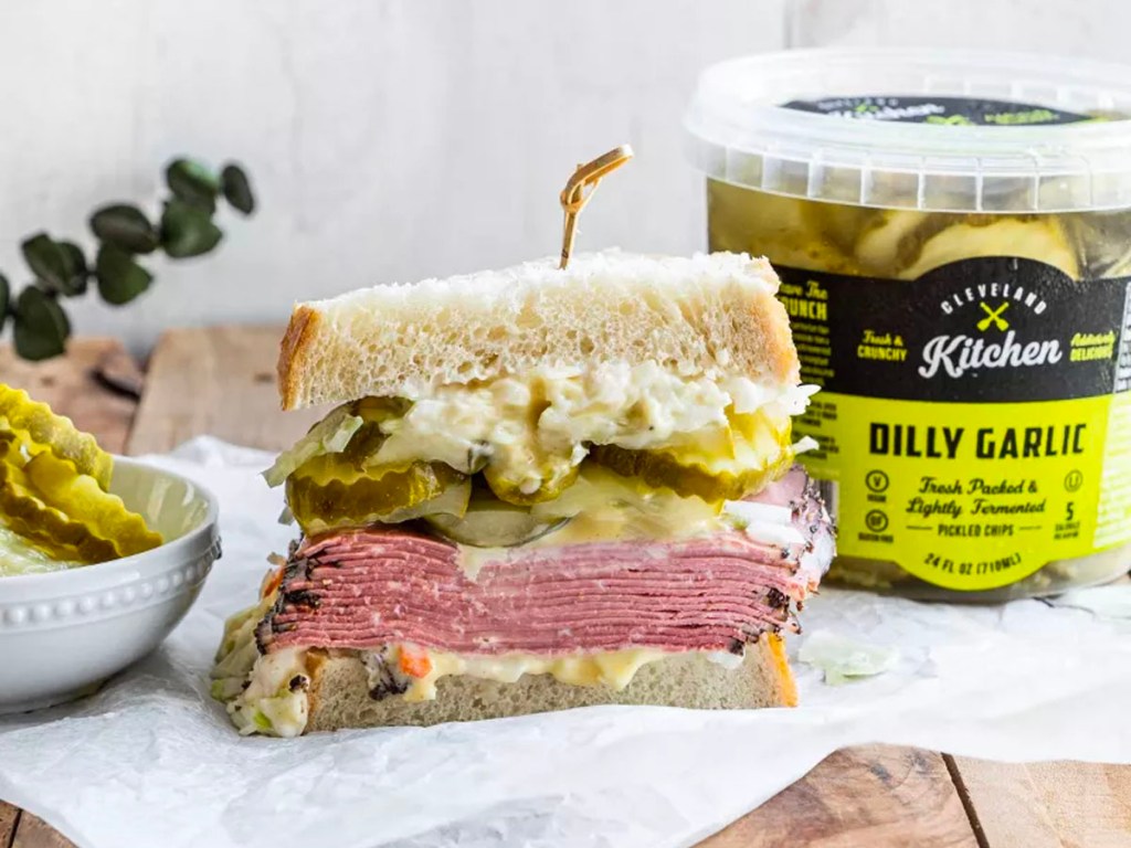 sandwich and jar of cleveland pickles on table