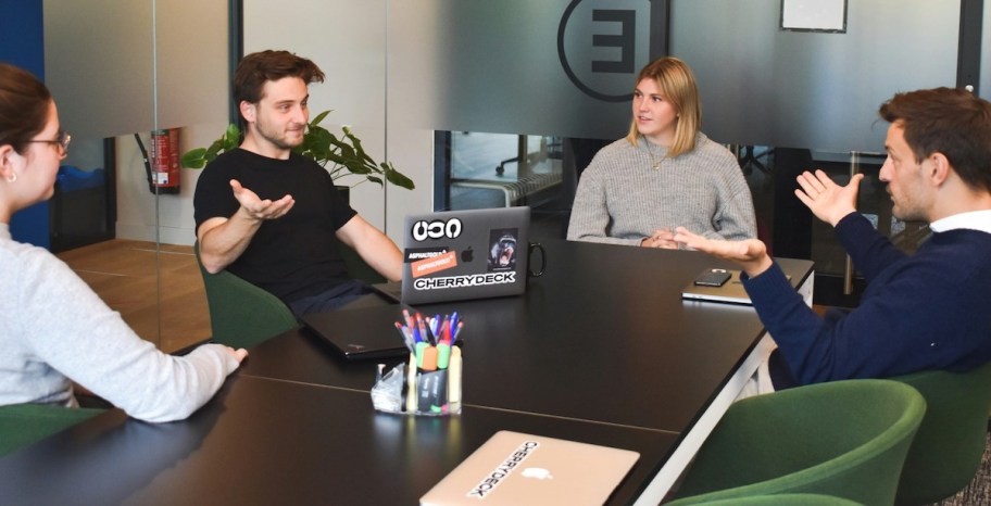 group of people sitting at table