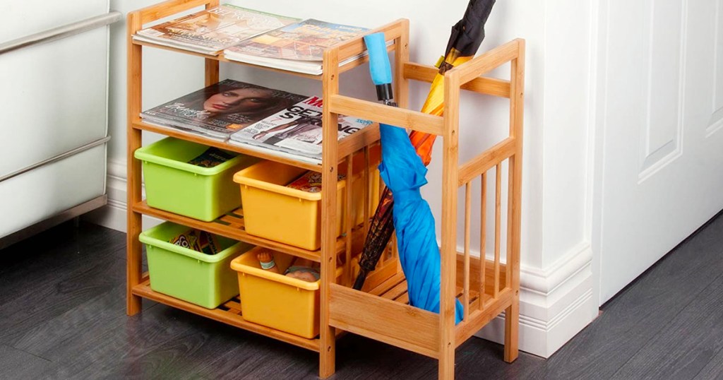 honey can do shelf with with umbrella and baskets 