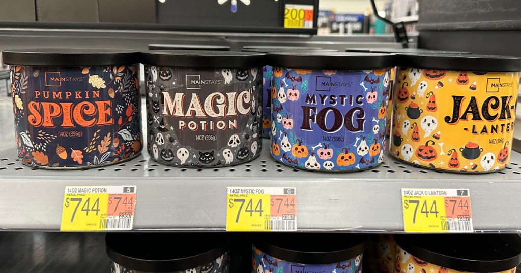 four mainstays halloween candles on shelf