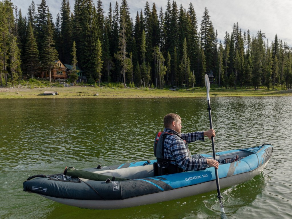 man on Aquaglide Chinook 100 Inflatable Kayak in a river