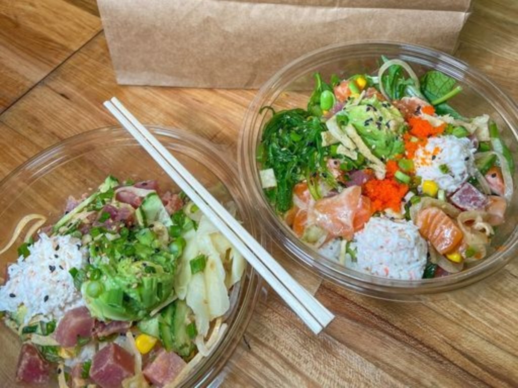 two poke bowls with chopsticks