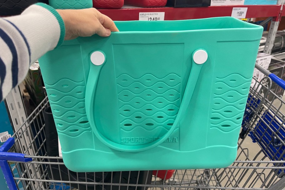 woman holding a sport brella bag at sam's club