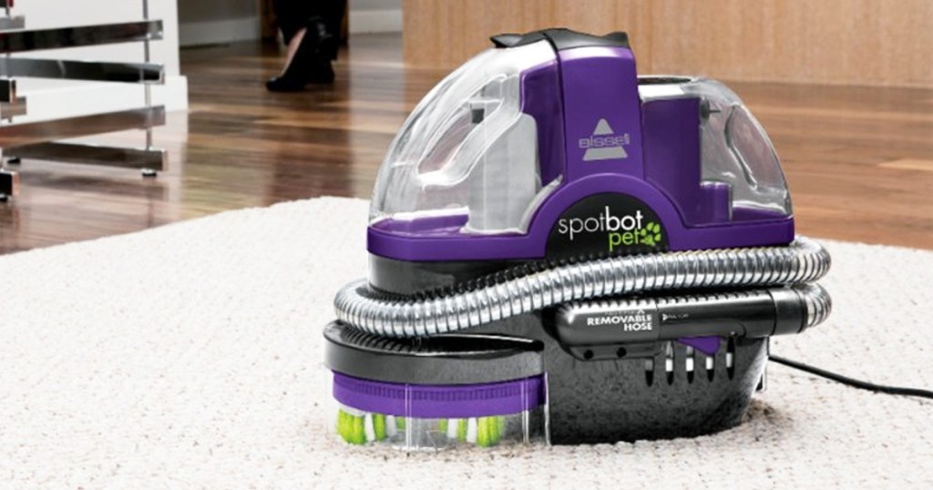 bissell spotbot on white carpet