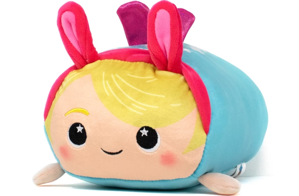 Plush toy that looks like a boy wearing Easter bunny ears