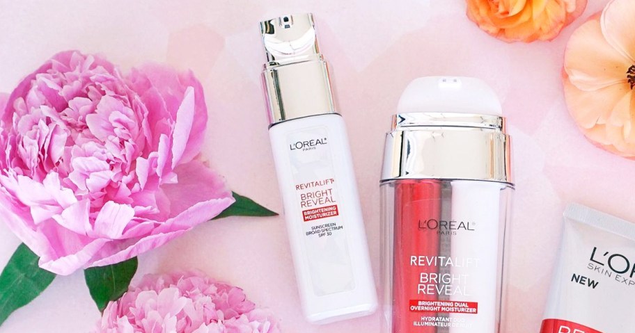 L'Oreal Paris Revitalift products near peony flowers