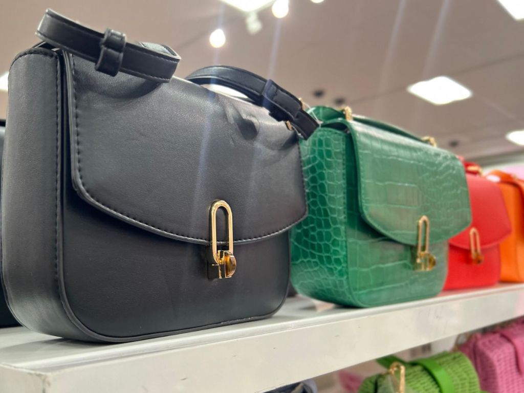 Shelf with several Target Crossbody Bags