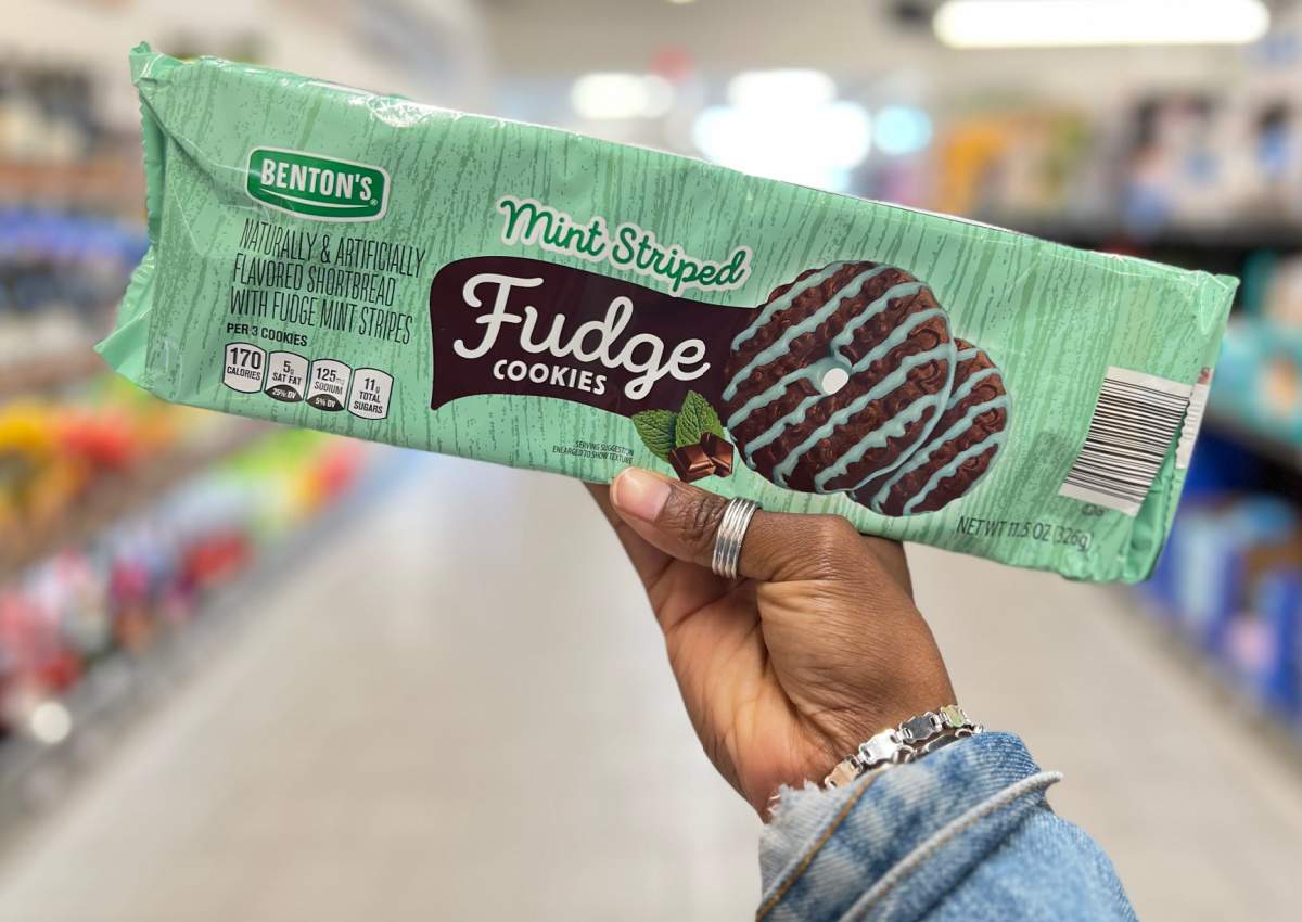 Hand holding ALDI Benton's mint fudge stripe cookies