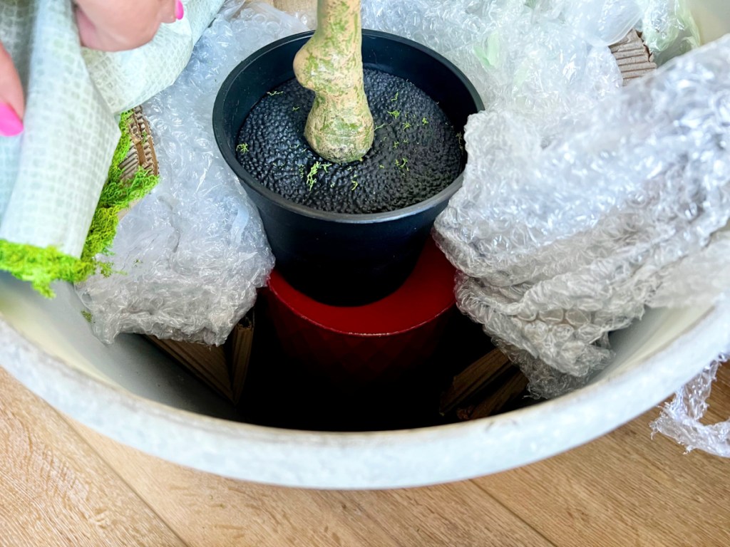 inside of faux tree pot