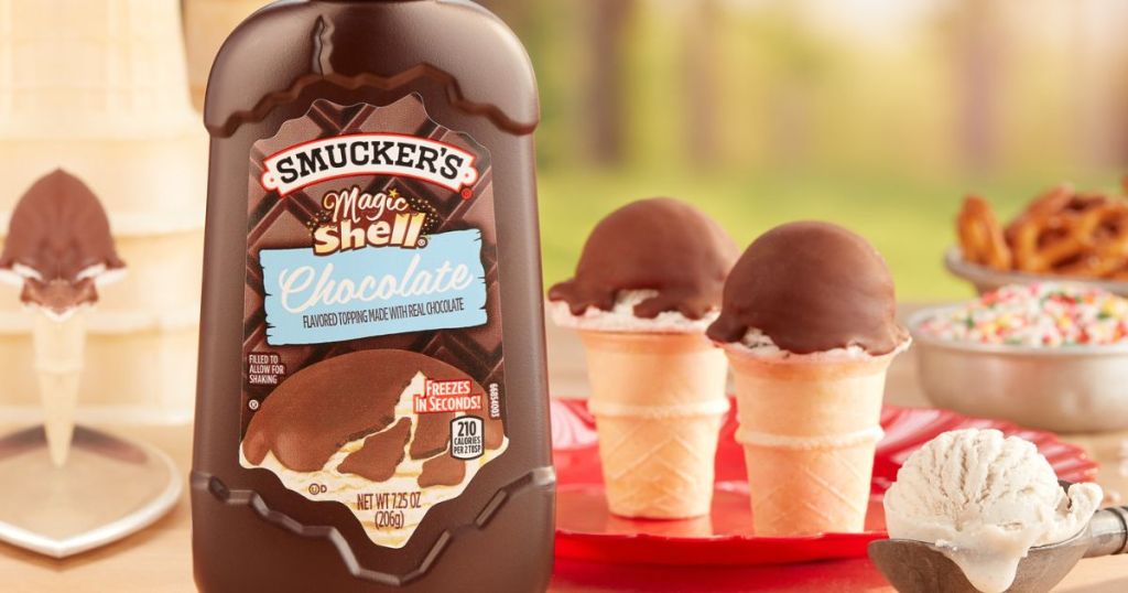 Smucker's Magic Shell Chocolate bottle with ice cream cones in background