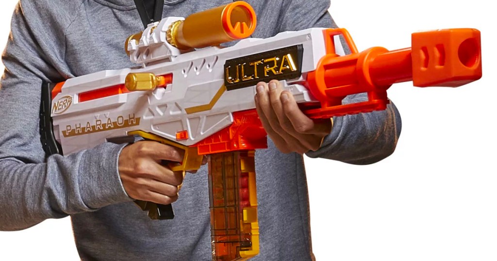 kid holding nerf ultra pharaoh blaster