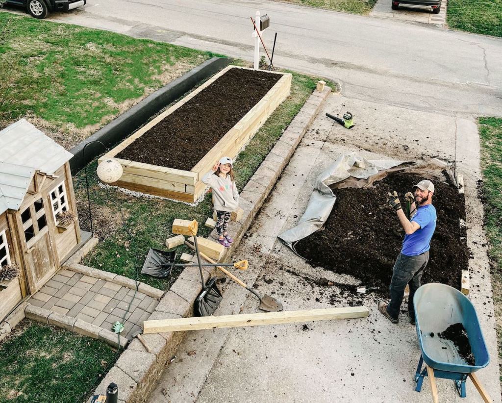 aerial photo of raised garden bed and soil onlinepost on driveway