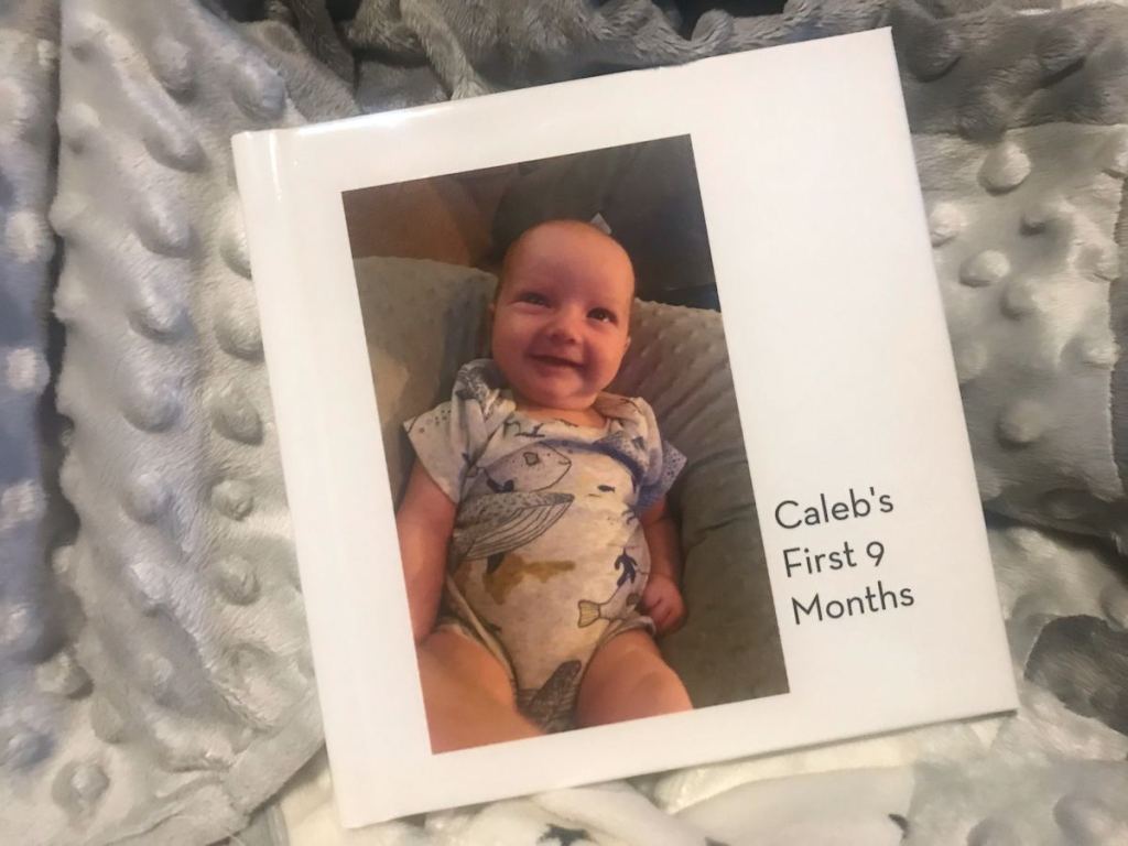 shutterfly baby book on mink blanket