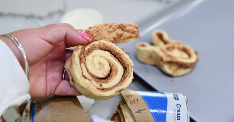 unrolling a cinnamon roll