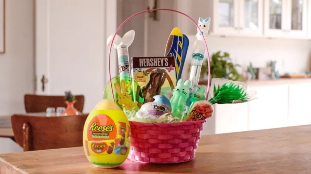 pink Easter basket filled with candy and toys