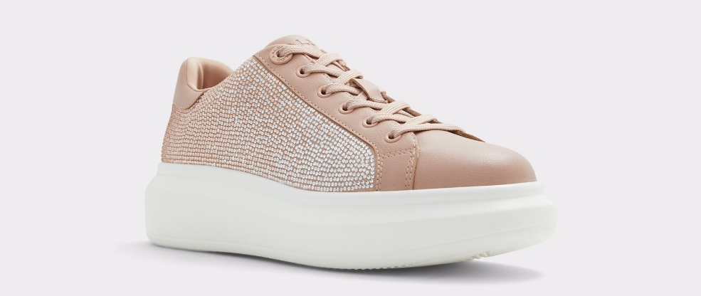 Tan and white platform sneaker with gemstones on the side