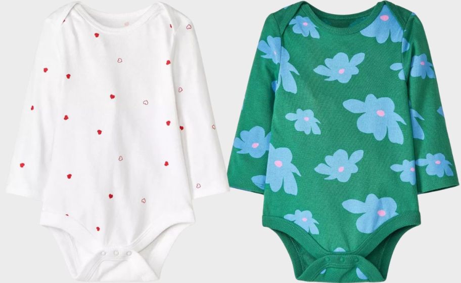 two printed baby onesies